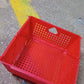 Compact folded storage basket demonstrating its space-saving design.