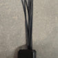 Solar powered garden light with glowing fiber optic strands in green lawn