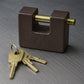 Front view of the heavy-duty black iron door lock with a brass core and five keys.