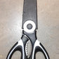 Angled view of the  Multi-Function Kitchen Scissor showcasing its ergonomic design.