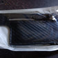 Mobile card pocket holder with adhesive backing for convenience.