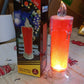 Close-up of the red LED candle, emphasizing its realistic flame-like appearance and safety features.