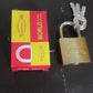 Angle view of a strong brass padlock, highlighting its solid construction.