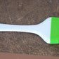 Silicone brush used for grilling and barbecues, part of CookAura kitchen utensils