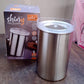 Konvex steel container filled with vibrant spices, highlighting its see-through lid.