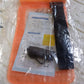 A user taking an underwater photo with their phone securely sealed in the waterproof pouch.