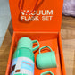 Compact green vacuum insulated flask set perfect for picnics and outdoor use