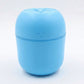Top-down view of the USB Air Humidifier, showing the water tank and control button.
