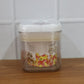Transparent airtight jar with vibrant red lid for snacks