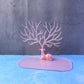 Detailed view of pink deer jewelry organizer stand, India