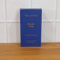 Lifestyle image of Bellavita men's luxury perfume in blue bottle