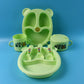 Kids feeding dinner set pieces arranged showing spoon, mug, bowl and plates