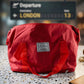 Top view of red travel carry bag demonstrating spaciousness