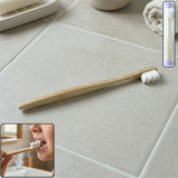 Eco-friendly wooden toothbrush with soft bristles and natural handle