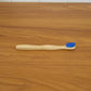 Wooden toothbrush in natural setting, eco-friendly material
