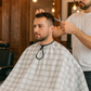Reusable hair cutting cape ideal for home and salon use
