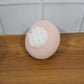 Neutral lifestyle image of bath scrubber in bathroom setting