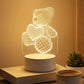 Close-up of 3D teddy bear illusion LED lamp