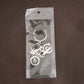 Lifestyle shot of a motorcycle silhouette metal keychain attached to a set of keys.