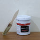 Live image showing black waterproof adhesive paste consistency and color