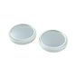 Close-up view of white round car blind spot mirror