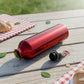 Portable 350ml reusable water bottle with secure screw cap and ergonomic carry ring