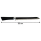 Bread knife used in kitchen with ergonomic grip for smooth cutting