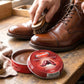 Leather shoe care cream in compact container