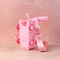 Front view of cartoon bus water bottle with comfortable strap for kids