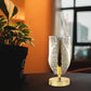 Crystal-cut LED table lamp with metallic base for home décor