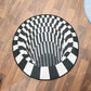 3D illusion round rug enhancing style in a modern living room