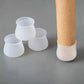 Transparent silicone pads attached to various furniture legs enhancing stability