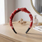Styled look of printed knot hairband