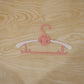 Multi-color children's hanger for nursery organizing