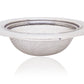 Stainless steel sink strainer seamlessly installed in a modern kitchen basin.