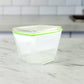 Two-piece food storage containers filled with snacks