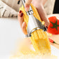 Close-up of serrated blade on stainless steel fruit and vegetable peeler