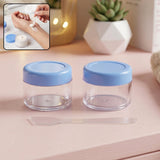 Empty plastic cosmetic cream jar set with spatula and blue lid