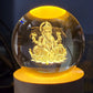 Side profile of the Ganpati 3D Crystal Ball Lamp, highlighting its sleek design and wooden stand.