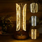 Sleek cylinder crystal table lamp on metallic base providing ambient lighting