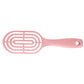 Detail of curved head and flexible bristles for scalp massage on hair brush