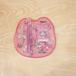 Pink kids stationery set displayed with all included items