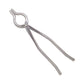 Close-up of durable stainless steel kitchen cooking tongs.