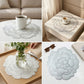 Decorative floral PVC table mat on a dining surface