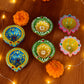 Collection of decorative clay diyas arranged for festival lighting