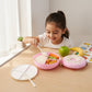 Donut Shaped Lunch Box filled with a variety of colorful and healthy food.