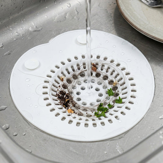 Hair catcher sink strainer in bathroom