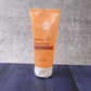 Face wash tube showing product details and ingredient highlights