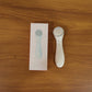 Facial massager device in action on face