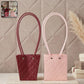 White background of floral gift bag highlighting waterproof feature